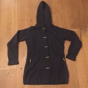 A black button up long sweater. Smartwool